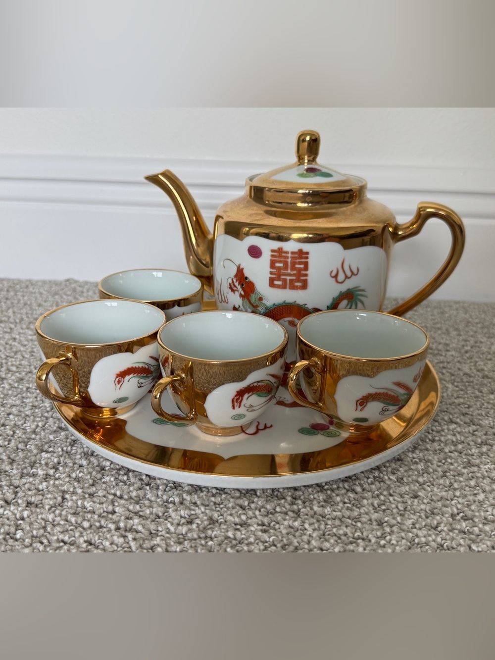 Porcelain tea set with Chinese deagon motifs